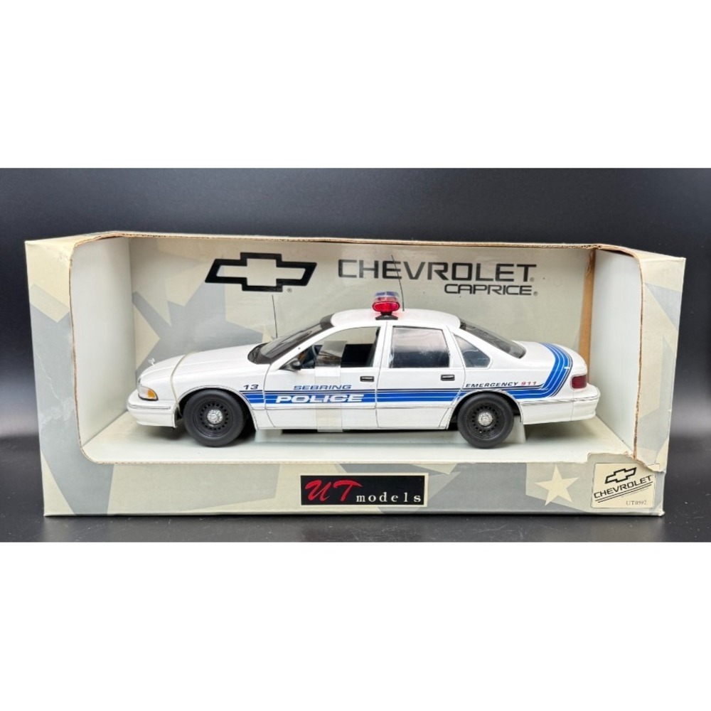 UT Models Chevrolet Caprice Sebring Police Vehicle 1:18 Diecast White/Blue